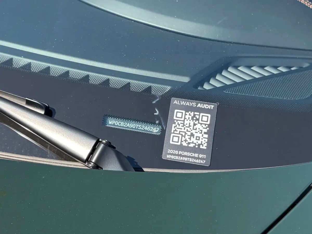 Always Audit QR label on the windshield cowl of a Porsche 911